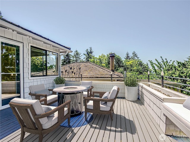 4441 53rd Ave SW, Seattle, WA 98116 - deck featuring an outdoor fire pit
