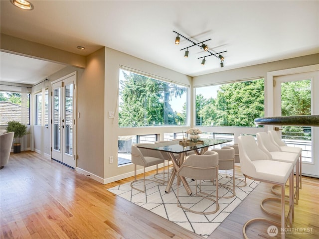 4441 53rd Ave SW, Seattle, WA 98116 - dining room with healthy amount of natural light and light wood-style floors