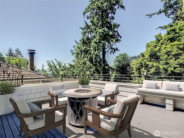 4441 53rd Ave SW, Seattle, WA 98116 - deck featuring a fire pit