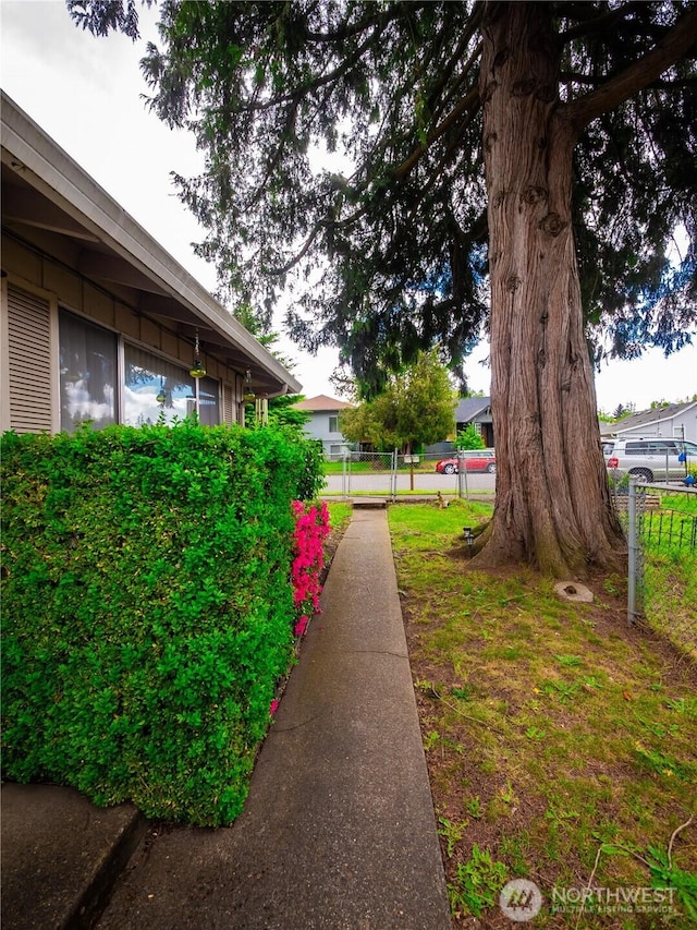 view of yard with fence