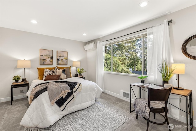 bedroom featuring a wall mounted AC, baseboards, carpet, and recessed lighting
