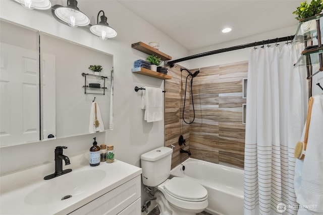bathroom with shower / tub combo with curtain, toilet, vanity, and recessed lighting