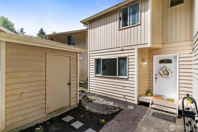 1342 NE Jasmine Ln, Bremerton, WA 98311 - view of exterior entry featuring board and batten siding
