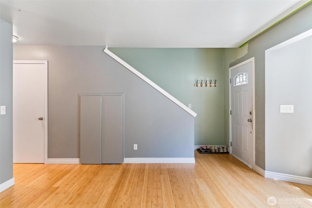1342 NE Jasmine Ln, Bremerton, WA 98311 - foyer featuring light wood-type flooring, baseboards, and stairs