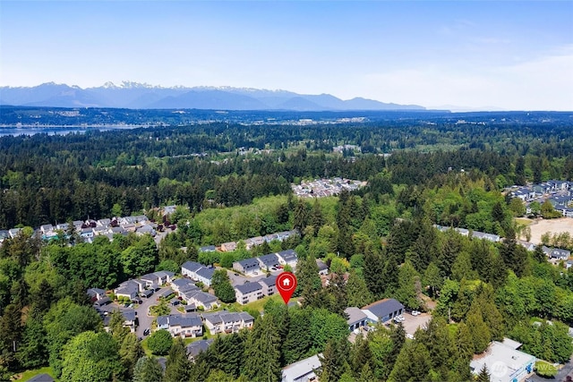1342 NE Jasmine Ln, Bremerton, WA 98311 - aerial view of property's location featuring a forest and a mountain backdrop