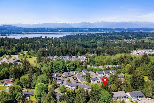 1342 NE Jasmine Ln, Bremerton, WA 98311 - aerial perspective of suburban area featuring a forest and a water and mountain view
