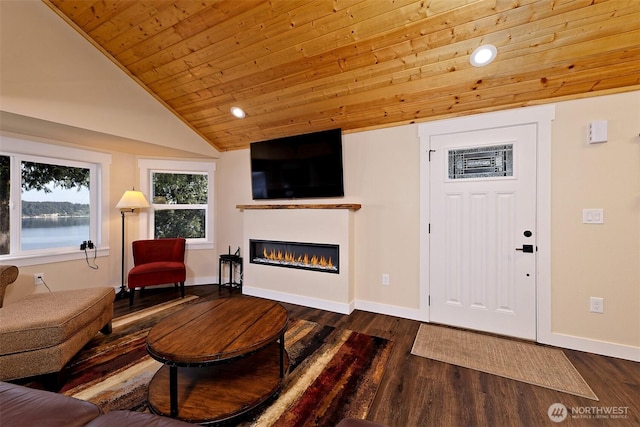 living area featuring wood ceiling, a glass covered fireplace, dark wood-style floors, baseboards, and vaulted ceiling