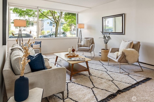 4540 8th Ave NE Unit 104, Seattle, WA 98105 - living area with baseboards and carpet flooring