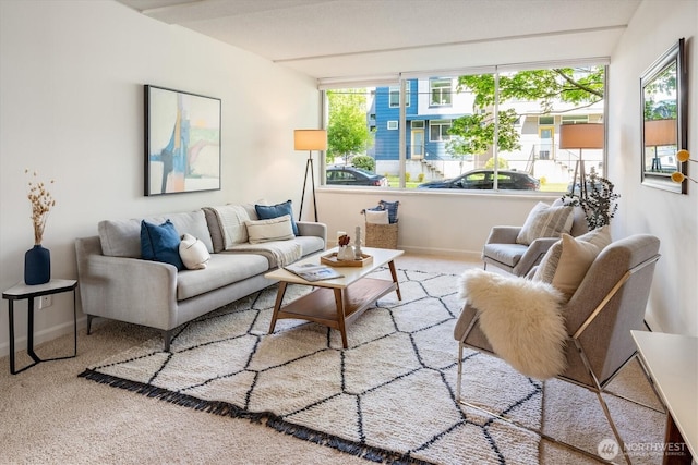 4540 8th Ave NE Unit 104, Seattle, WA 98105 - carpeted living room featuring baseboards