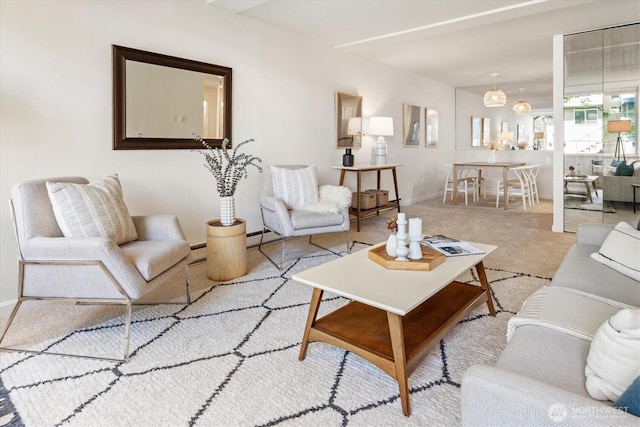 4540 8th Ave NE Unit 104, Seattle, WA 98105 - living room featuring baseboards, a baseboard heating unit, and carpet flooring