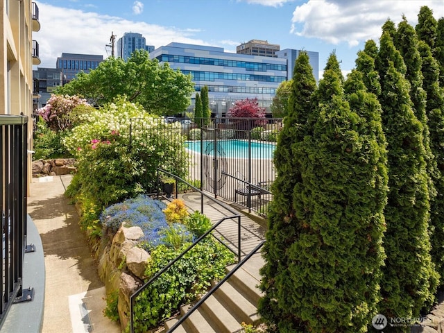 4540 8th Ave NE Unit 104, Seattle, WA 98105 - community pool with fence and a city view