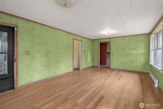 4319 SW Mills St, Seattle, WA 98136 - empty room featuring light wood-type flooring and crown molding