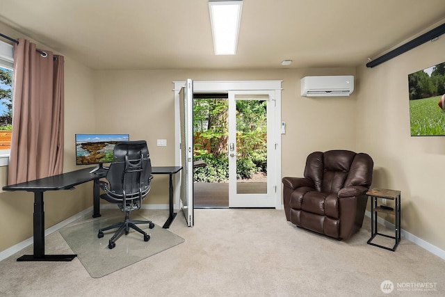 office area featuring a wall mounted air conditioner, carpet, and plenty of natural light