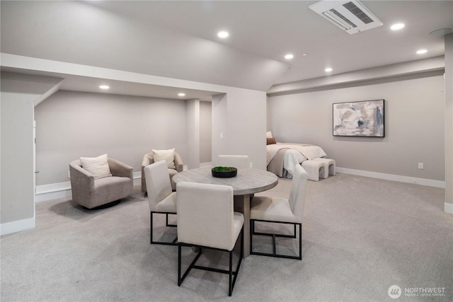 carpeted dining space featuring recessed lighting, baseboards, and lofted ceiling