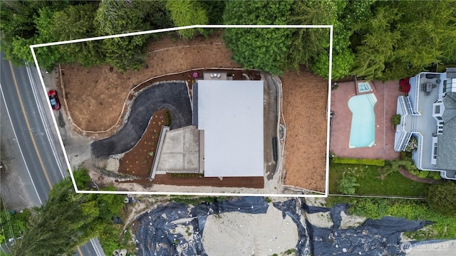 aerial overview of property's location featuring property boundaries highlighted