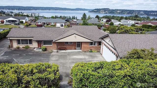 1260 S Karl Johan Ave, Tacoma, WA 98465 - aerial perspective of suburban area with a large body of water
