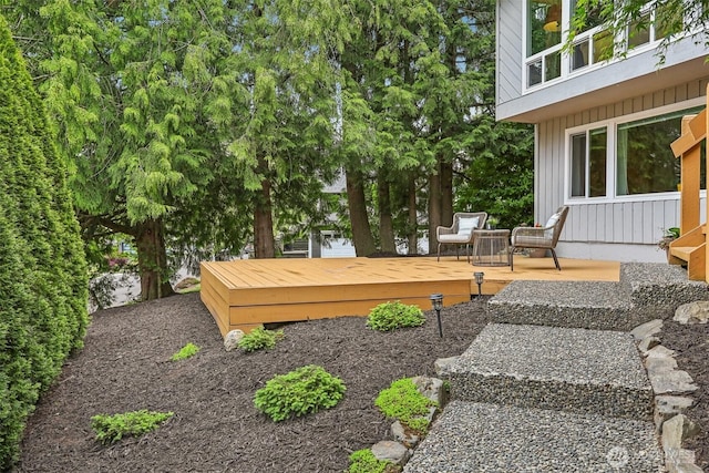 view of yard with a wooden deck