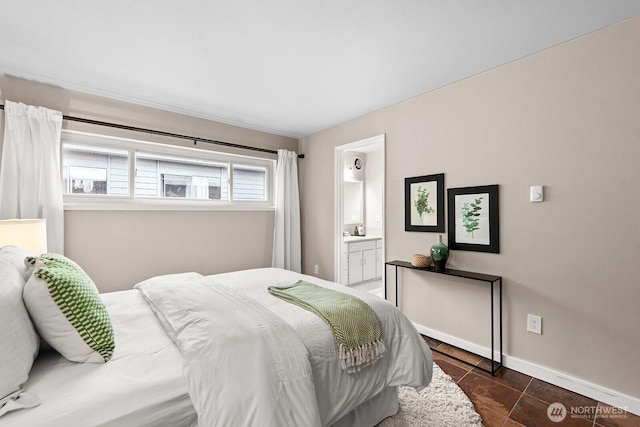 11515 Greenwood Ave N Unit B, Seattle, WA 98133 - bedroom with ensuite bath and dark tile patterned floors