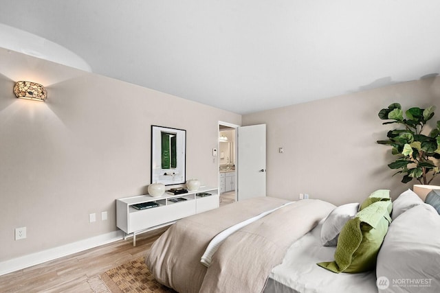 11515 Greenwood Ave N Unit B, Seattle, WA 98133 - bedroom featuring light wood-style floors and ensuite bathroom