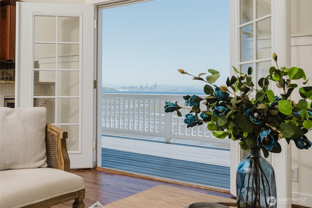 9788 Manitou Beach Dr NE, Bainbridge Island, WA 98110 - living area featuring a water view and wood finished floors