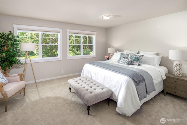 9788 Manitou Beach Dr NE, Bainbridge Island, WA 98110 - bedroom featuring baseboards and light carpet