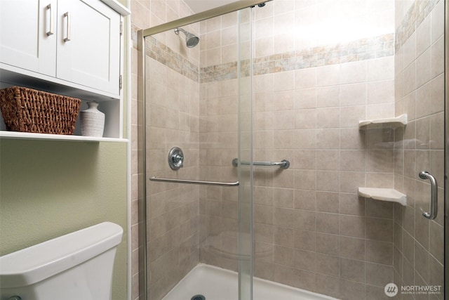 9788 Manitou Beach Dr NE, Bainbridge Island, WA 98110 - bathroom with a shower stall and toilet