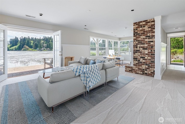 9788 Manitou Beach Dr NE, Bainbridge Island, WA 98110 - living area featuring light colored carpet