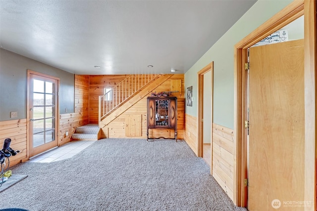 545 Sagebrush Dr, Ephrata, WA 98823 - living room with wooden walls, carpet, stairway, and wainscoting