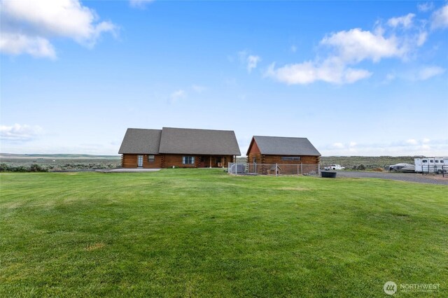 545 Sagebrush Dr, Ephrata, WA 98823 - log-style house with a front lawn