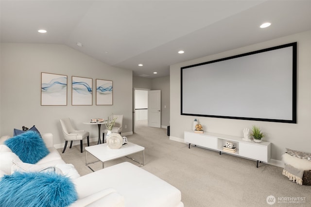 carpeted cinema with recessed lighting, lofted ceiling, and baseboards