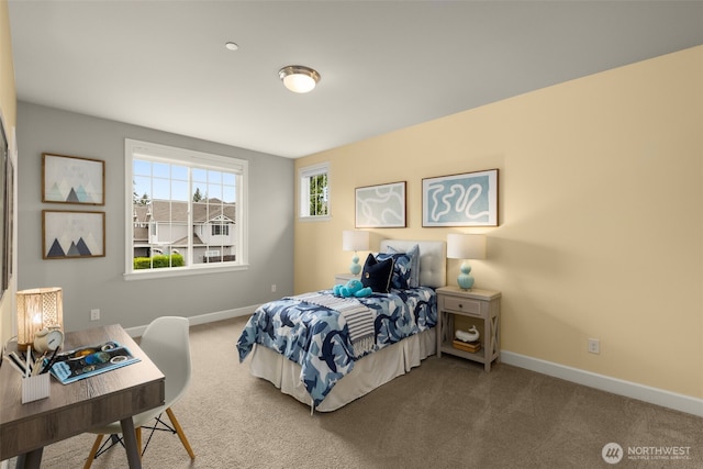 bedroom with baseboards, carpet, and a desk