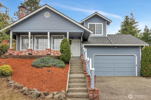 2711 NE 4th Ct, Renton, WA 98056 - view of front of home with a chimney, asphalt driveway, a garage, and roof with shingles