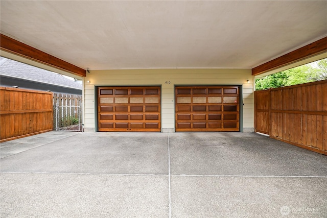 garage with fence
