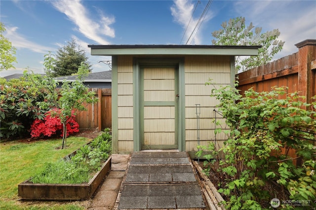 view of shed featuring a garden
