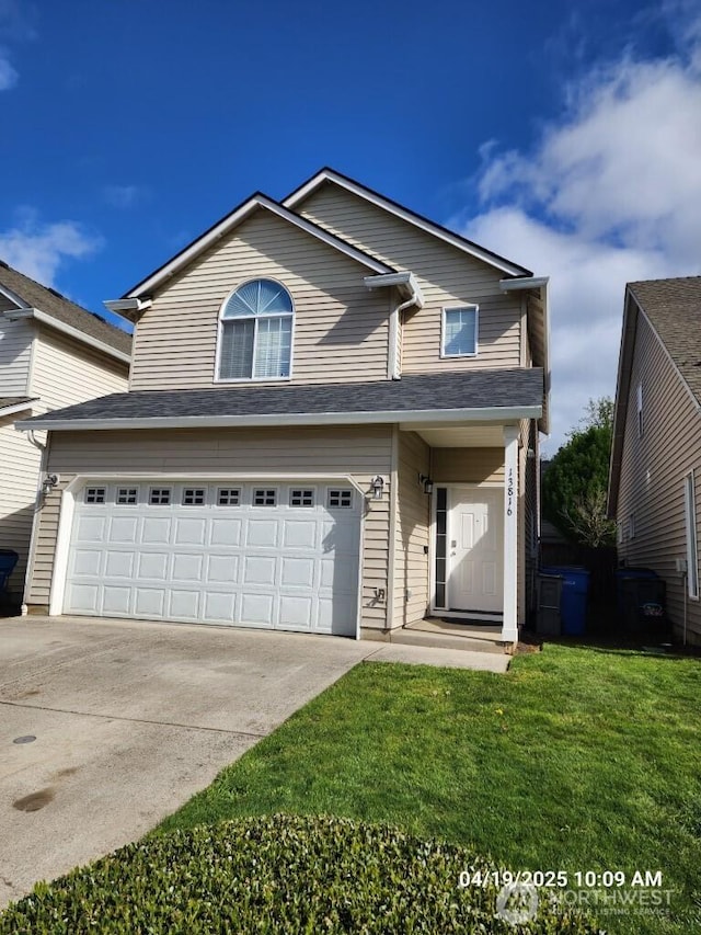 13816 NE 63rd St, Vancouver, WA 98682 - traditional home featuring concrete driveway, a garage, and a front yard