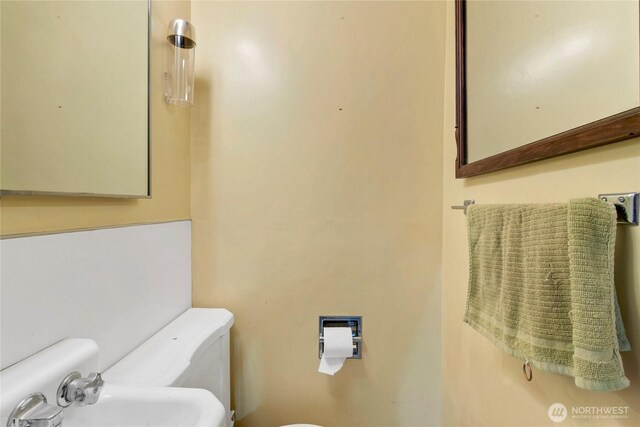 1420 S Verde St, Tacoma, WA 98405 - half bathroom featuring toilet and a sink