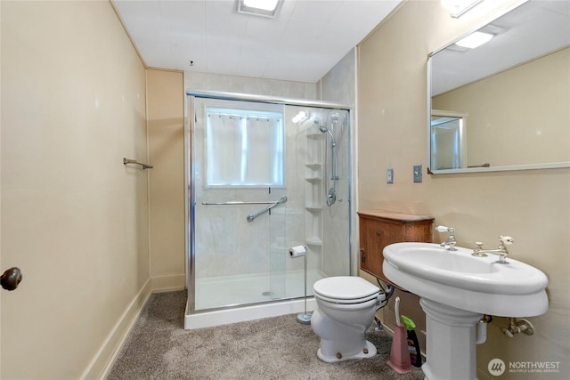 1420 S Verde St, Tacoma, WA 98405 - full bathroom featuring a stall shower, toilet, and baseboards