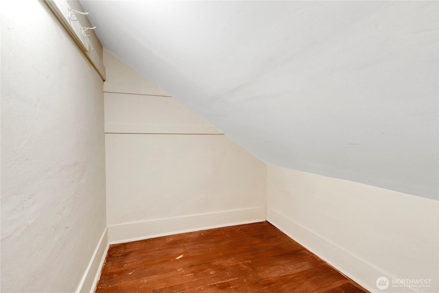 1420 S Verde St, Tacoma, WA 98405 - additional living space with wood-type flooring, vaulted ceiling, and baseboards