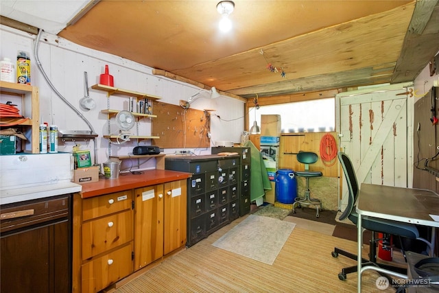 1420 S Verde St, Tacoma, WA 98405 - basement with wood walls and a workshop area