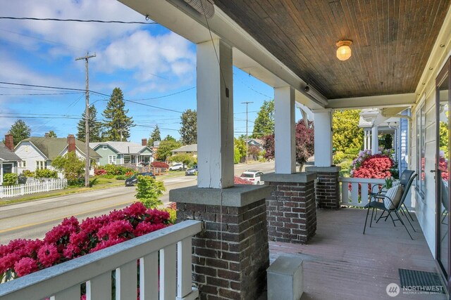 view of patio / terrace featuring covered porch and a residential view