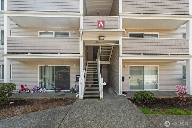 view of building exterior with stairway
