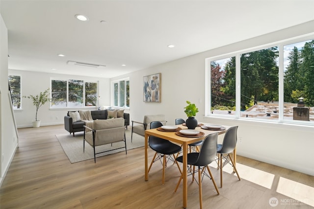 20311 14th Ave NE Unit A, Shoreline, WA 98155 - dining space featuring healthy amount of natural light, light wood-type flooring, recessed lighting, and baseboards