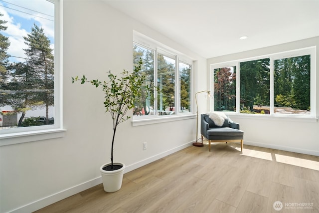 20311 14th Ave NE Unit A, Shoreline, WA 98155 - living area with plenty of natural light, baseboards, and wood finished floors
