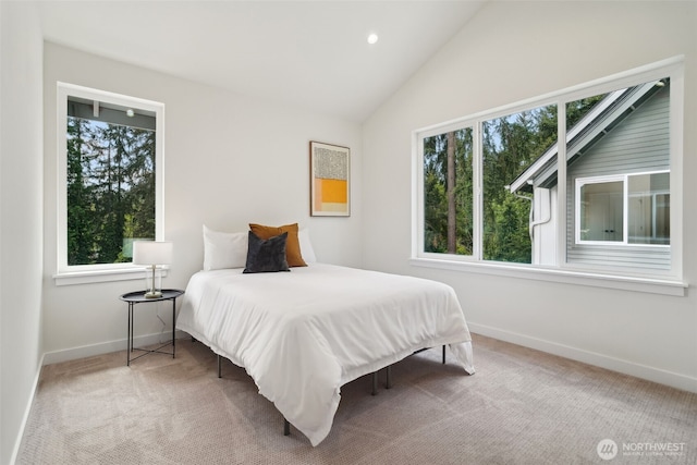 20311 14th Ave NE Unit A, Shoreline, WA 98155 - carpeted bedroom with multiple windows, baseboards, vaulted ceiling, and recessed lighting