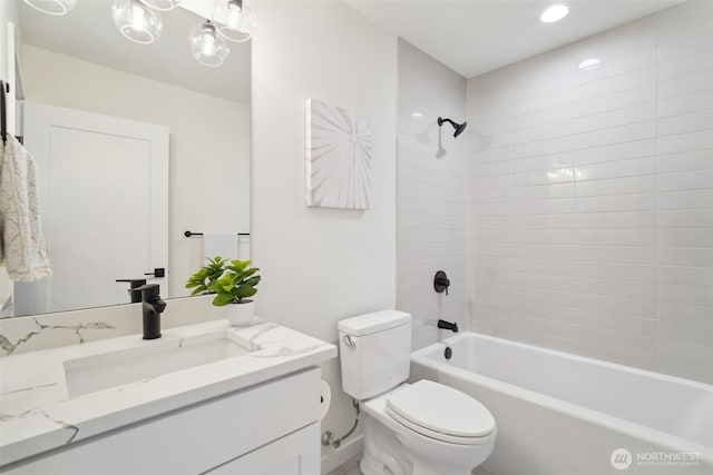 20311 14th Ave NE Unit A, Shoreline, WA 98155 - bathroom featuring vanity, toilet, shower / bathtub combination, and recessed lighting