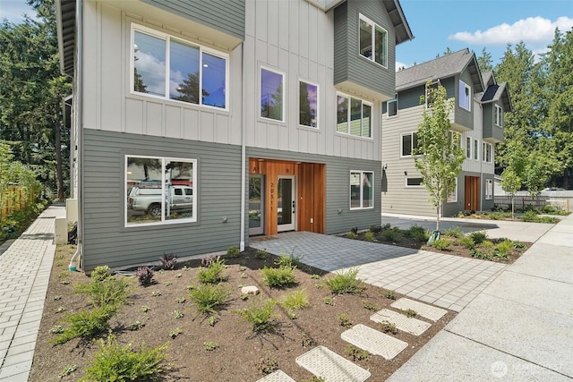 20311 14th Ave NE Unit A, Shoreline, WA 98155 - rear view of house with board and batten siding