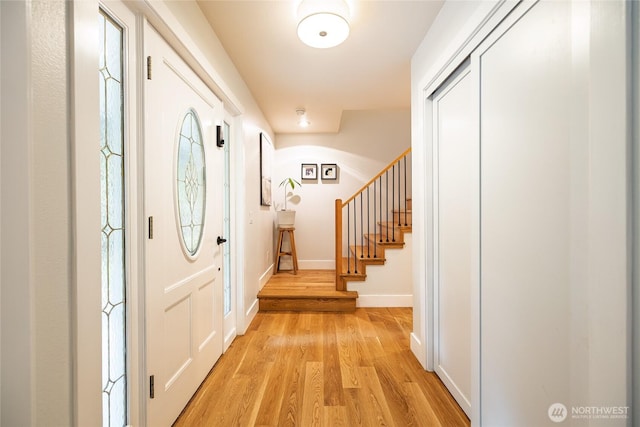 35717 321st St NE, Arlington, WA 98223 - foyer with light wood-style floors, baseboards, and stairway