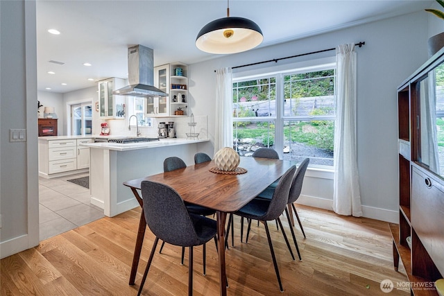 35717 321st St NE, Arlington, WA 98223 - dining room featuring light wood-style floors, baseboards, and recessed lighting