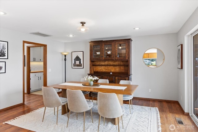 15208 W Lake Goodwin Rd, Stanwood, WA 98292 - dining area featuring wood finished floors, baseboards, and recessed lighting