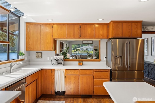 15208 W Lake Goodwin Rd, Stanwood, WA 98292 - kitchen with appliances with stainless steel finishes, a sink, light countertops, recessed lighting, and wood finished floors